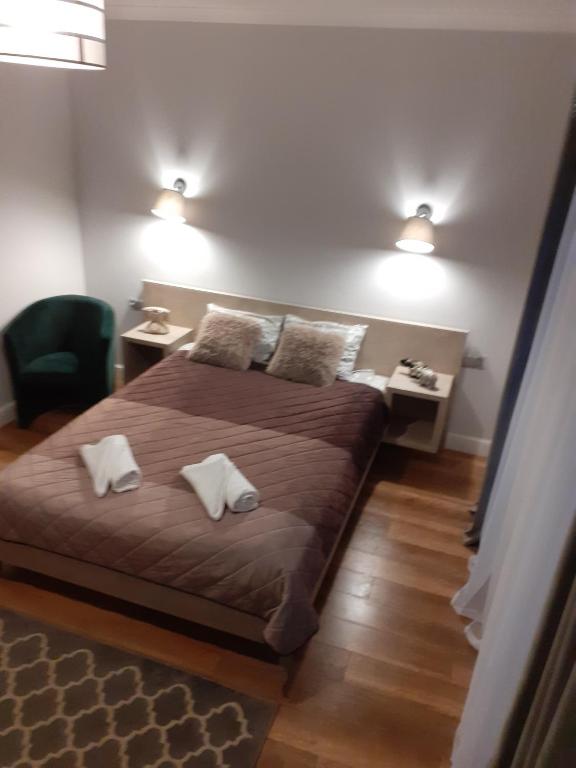 Postel nebo postele na pokoji v ubytování VILLA EDEN USTKA wypoczynek dla dorosłych