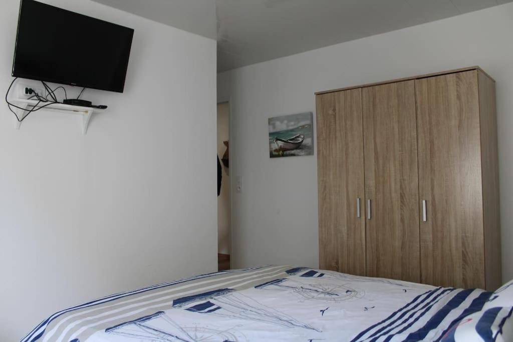 Postel nebo postele na pokoji v ubytování « L’OCEANIX » Vue Grande Plage 2ch Wifi