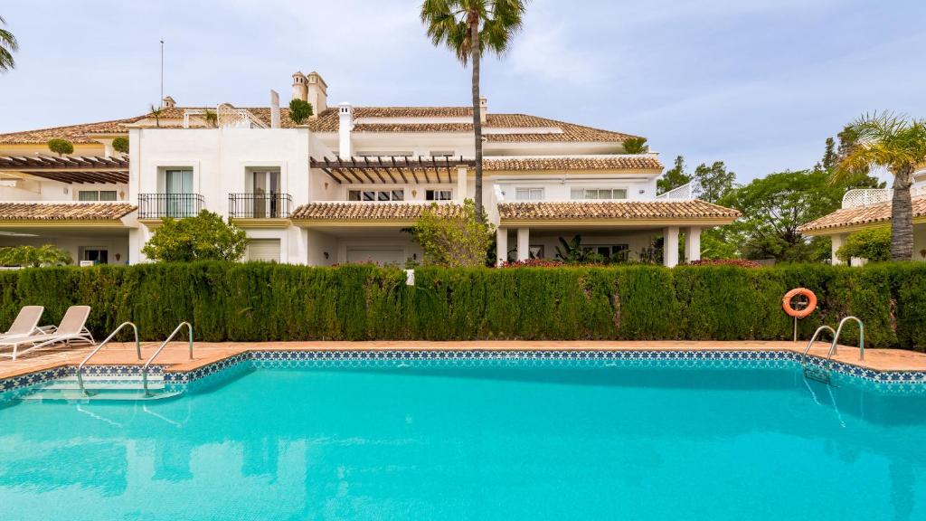 Bazén v ubytovaní Luxury apartment at Monte Paraiso alebo v jeho blízkosti