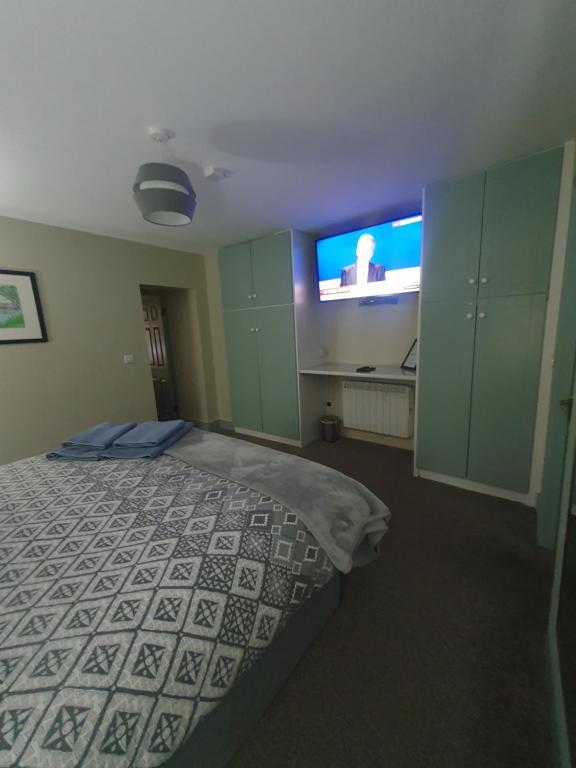 Postel nebo postele na pokoji v ubytování Junior Suite Town Centre
