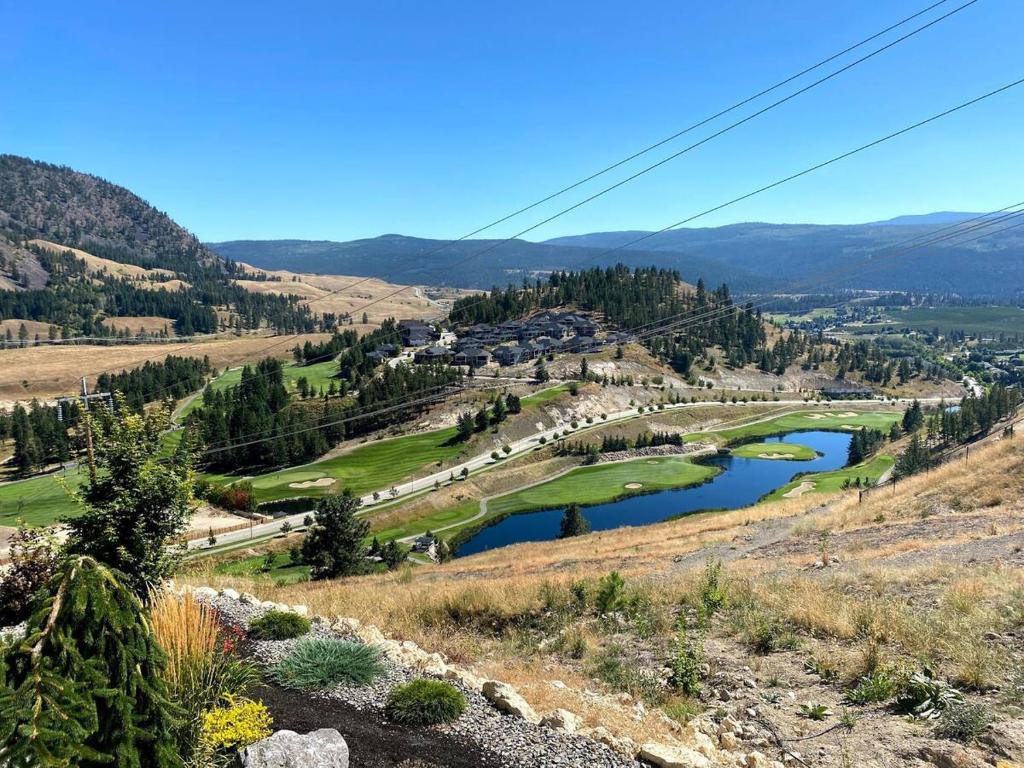 a view from the top of a hill with a river at Black Mountain Amazing Home on Golf Course in Kelowna