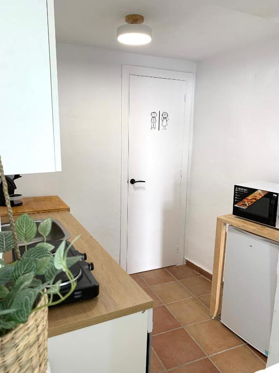 Kuchyň nebo kuchyňský kout v ubytování Casita Menta - Alojamiento único en el Centro de Torrox