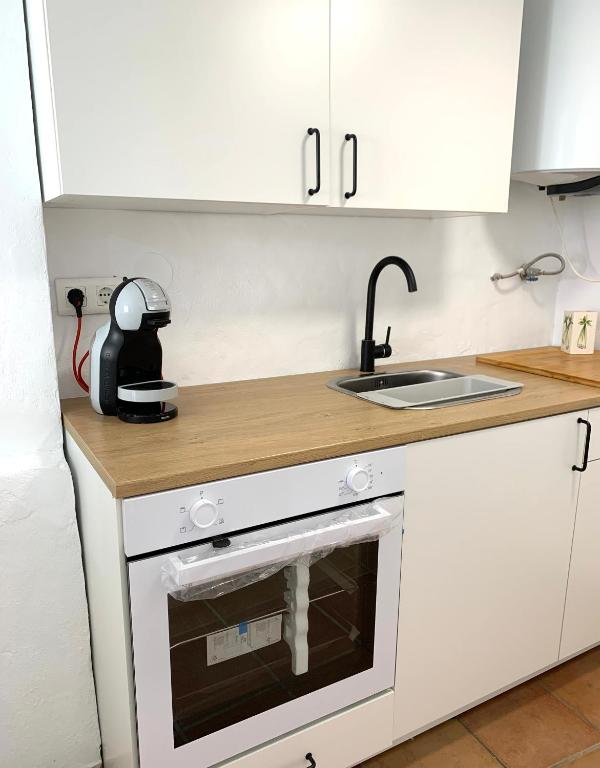Kuchyň nebo kuchyňský kout v ubytování Casita Menta - Alojamiento único en el Centro de Torrox