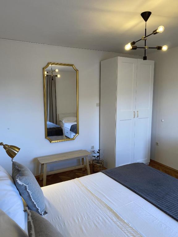 Posteľ alebo postele v izbe v ubytovaní Apartments Skako