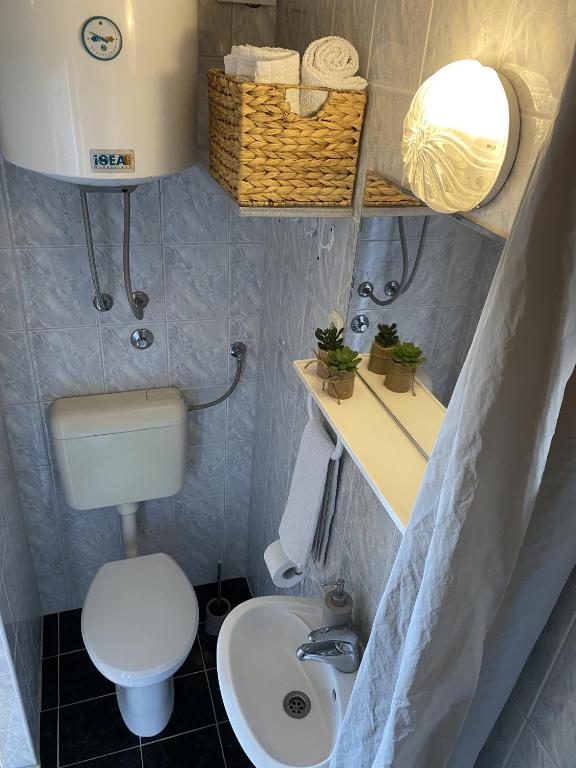 Kúpeľňa v ubytovaní Apartments Skako