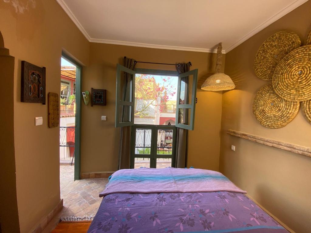 Letto o letti in una camera di Riad Tafilag