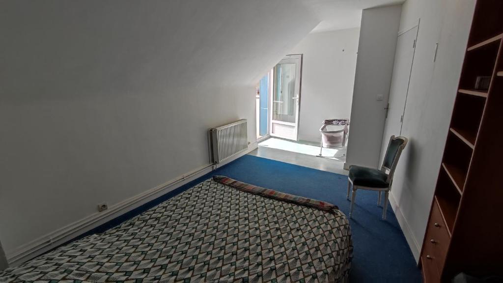 Posteľ alebo postele v izbe v ubytovaní La Chaumière de Chaumont