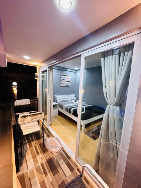 Postel nebo postele na pokoji v ubytování D' Beach Resort