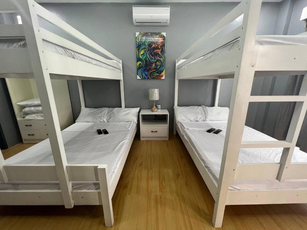 Postel nebo postele na pokoji v ubytování D' Beach Resort