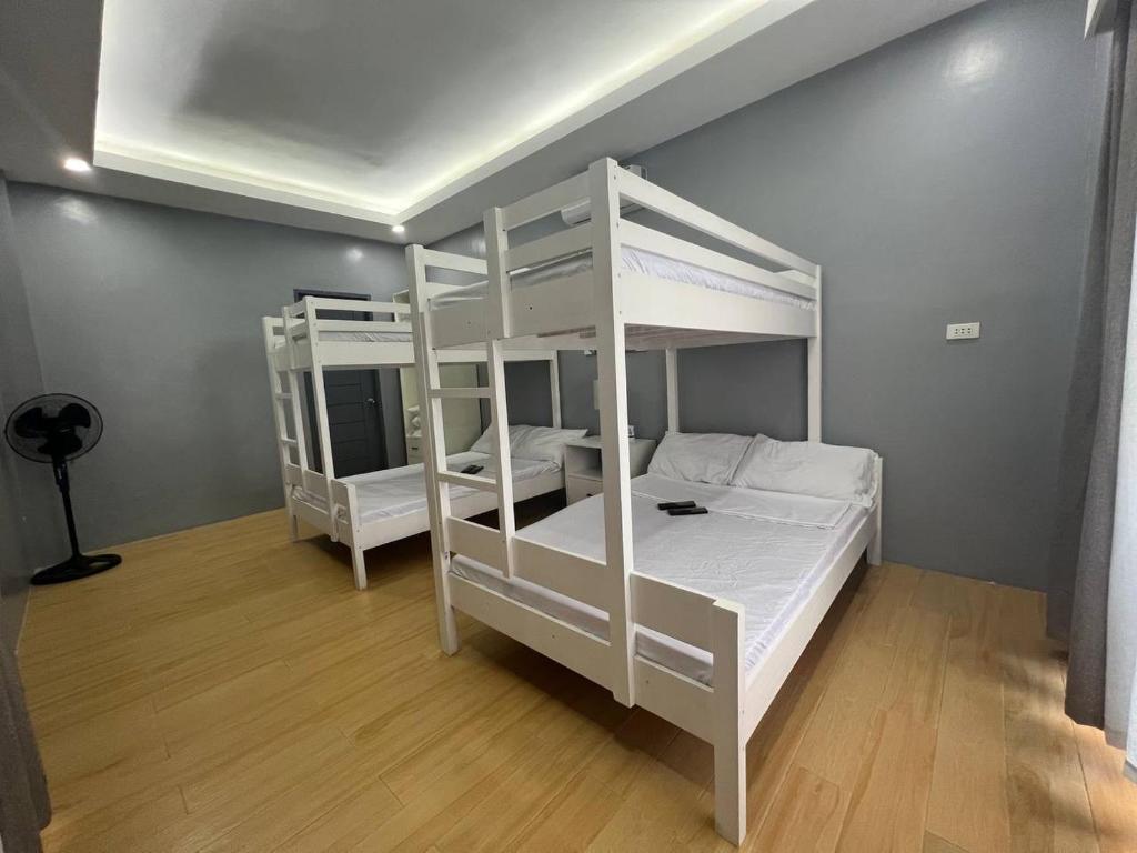 Postel nebo postele na pokoji v ubytování D' Beach Resort