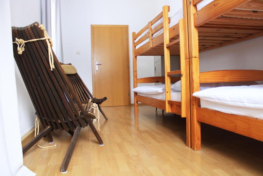 Postel nebo postele na pokoji v ubytování Hostel Kronotop in Triglav National Park