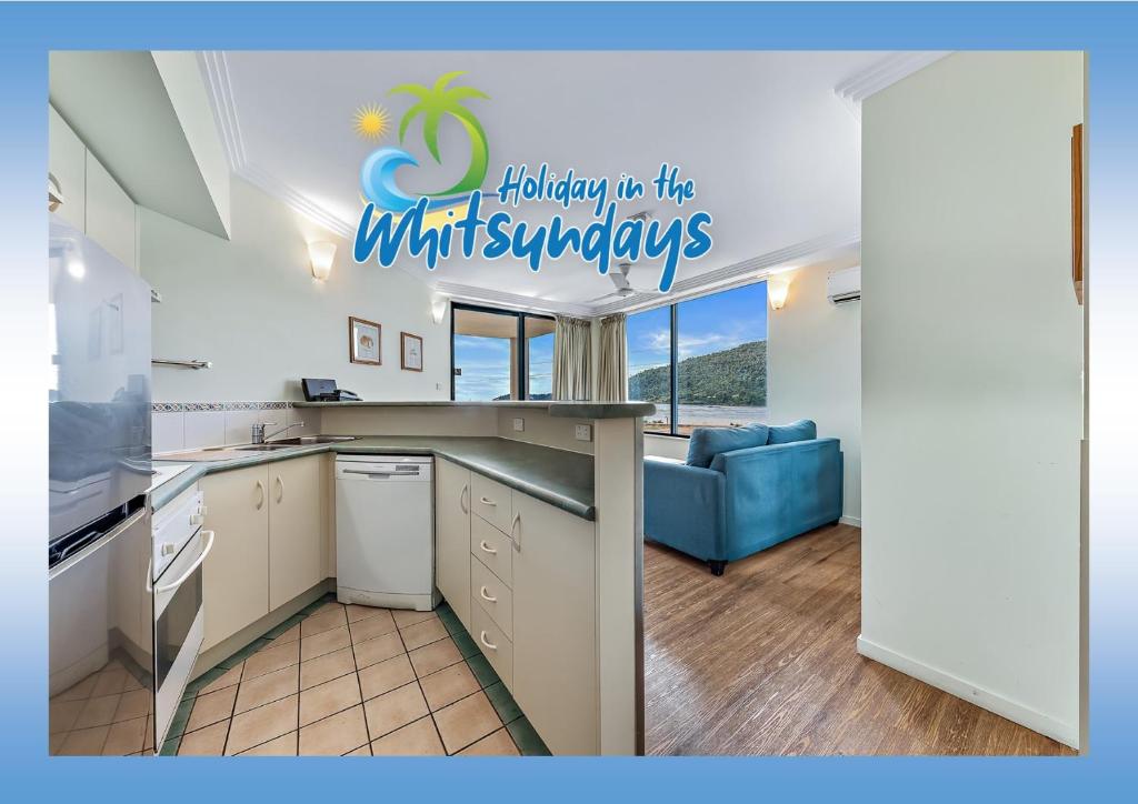 Η κουζίνα ή μικρή κουζίνα στο Marina views at Airlie 10F - 1 bedroom