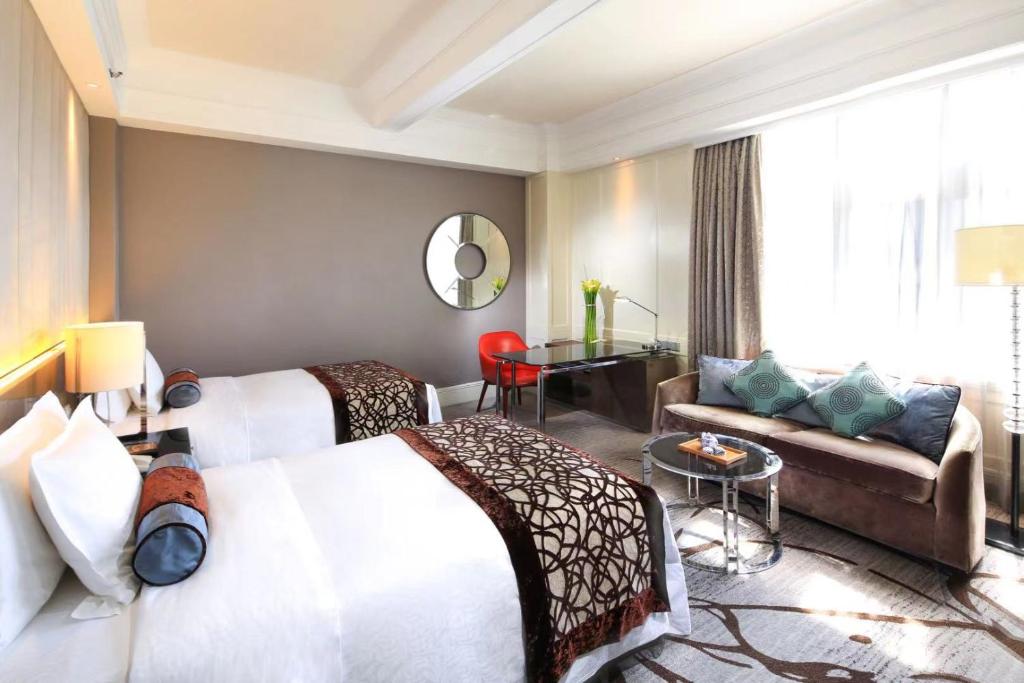Posezení v ubytování Jin Jiang Hotel