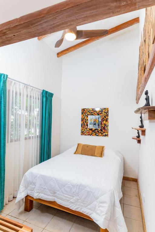 Postel nebo postele na pokoji v ubytování Hacienda La Norma Boho Boutique Hotel