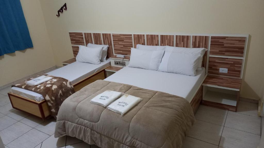 Postel nebo postele na pokoji v ubytování Hotel Dalias