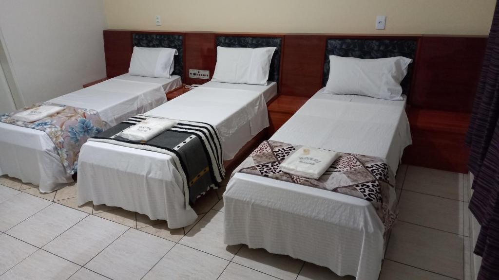 Postel nebo postele na pokoji v ubytování Hotel Dalias