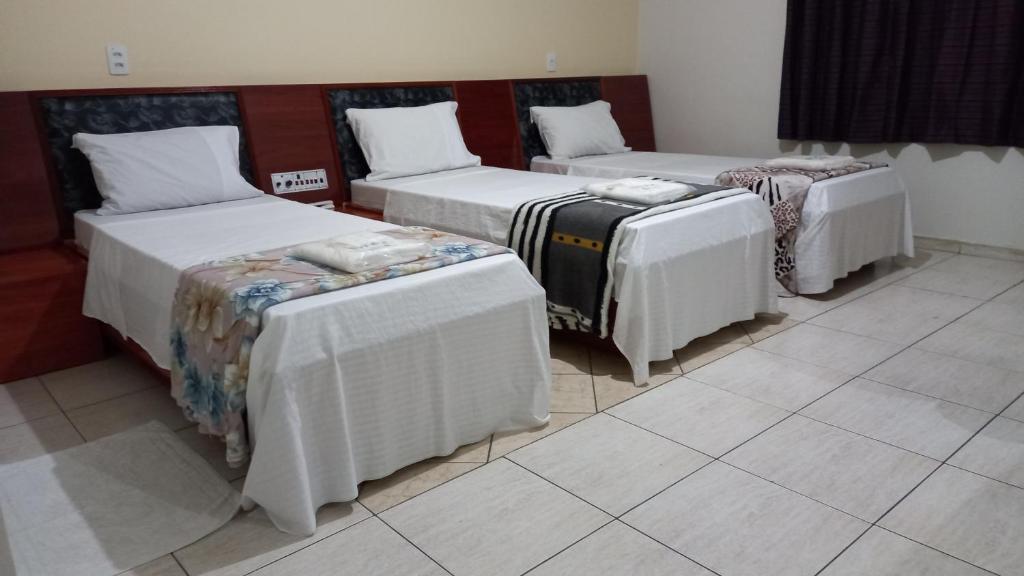 Postel nebo postele na pokoji v ubytování Hotel Dalias