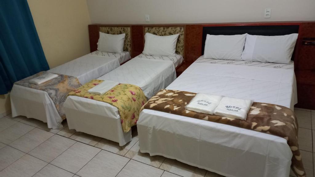 Postel nebo postele na pokoji v ubytování Hotel Dalias