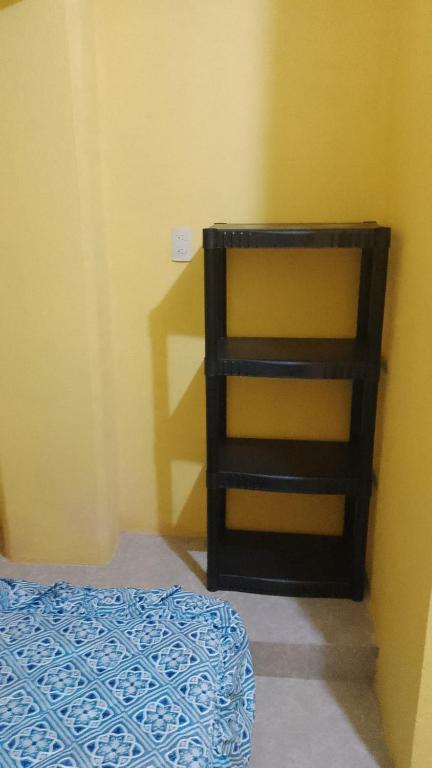 Postel nebo postele na pokoji v ubytování El Rincón del Ángel Tuxpan