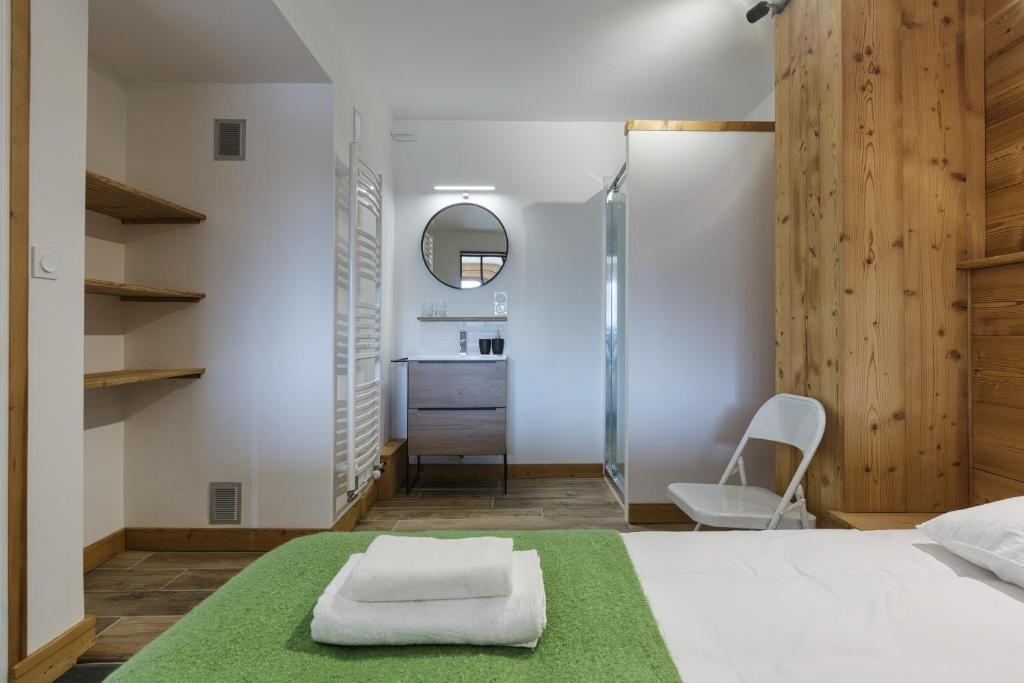 Posteľ alebo postele v izbe v ubytovaní Appartement Flégère et Golf - Happy Rentals