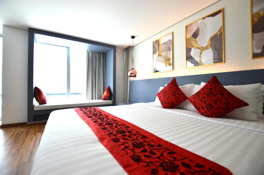 Postel nebo postele na pokoji v ubytování I Residence Hotel Silom