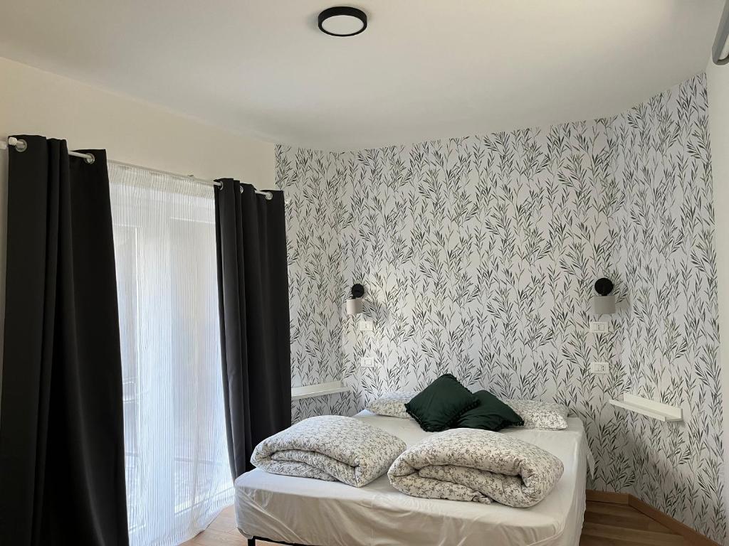 Postel nebo postele na pokoji v ubytování Corte Torchio B&B