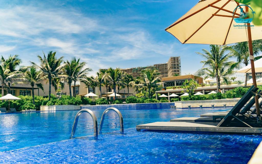Bazén v ubytování Lumina Villas Cam Ranh, Bai Dai beach luxury resort villas nebo v jeho okolí