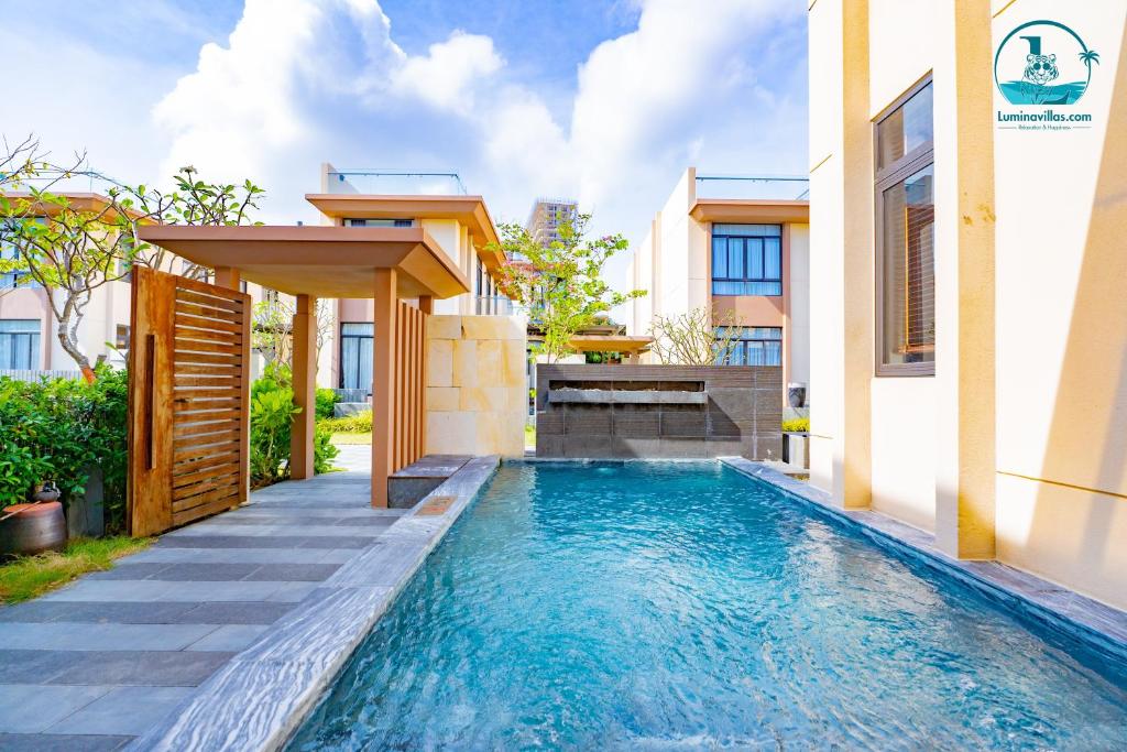 Bazén v ubytování Lumina Villas Cam Ranh, Bai Dai beach luxury resort villas nebo v jeho okolí
