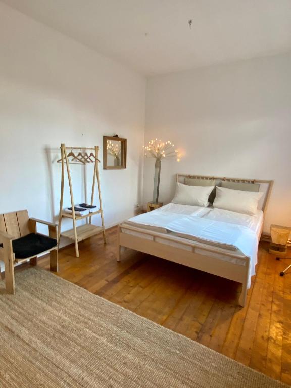 Postel nebo postele na pokoji v ubytování Kläve12 Guesthouse