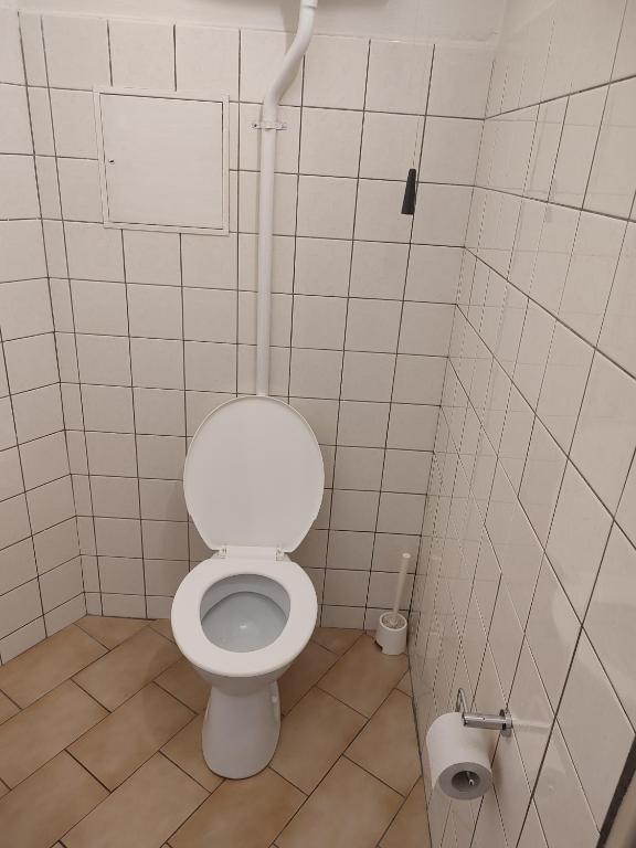 Koupelna v ubytování BEST Hotel Garni