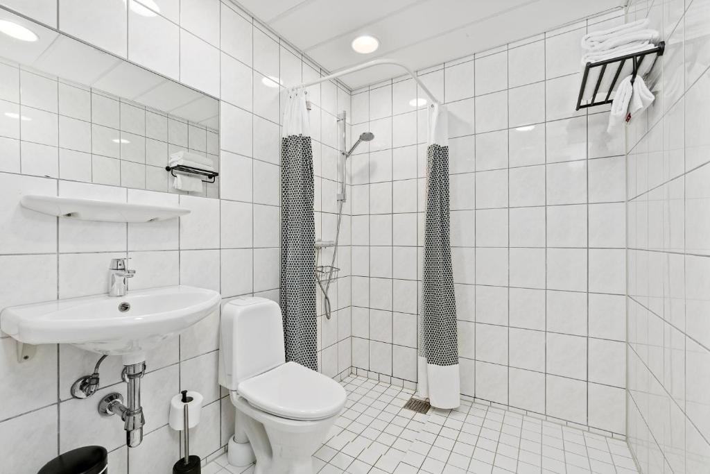 Koupelna v ubytování Ibsens Hotel