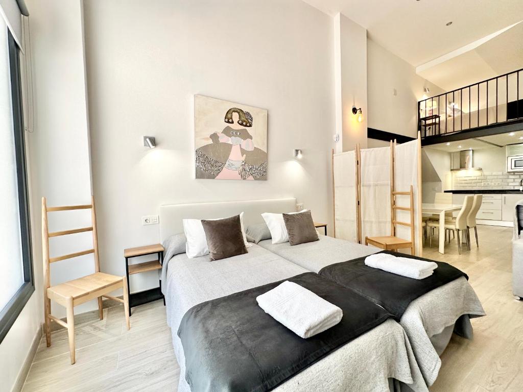 a bedroom with a large bed in a room at Loft Marbella Center in Marbella