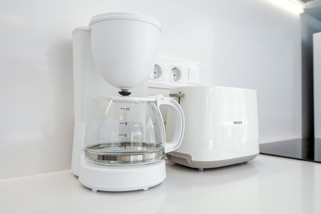 Coffee and tea making facilities at Stunning Apartment with Ocean View