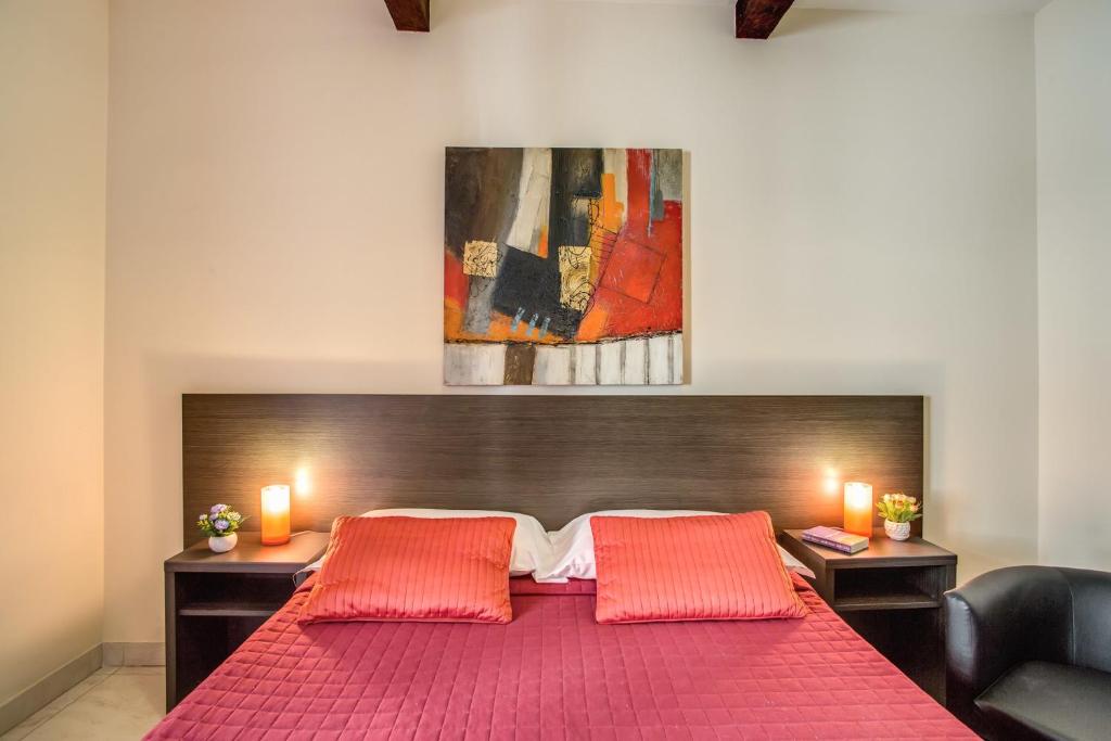 Postel nebo postele na pokoji v ubytování Hotel Mosaic