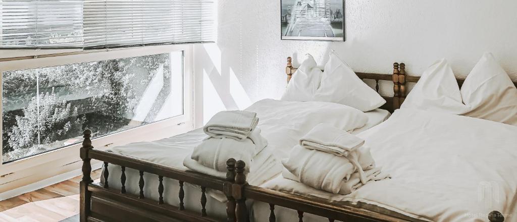 Postel nebo postele na pokoji v ubytování Hotel Regina Terme