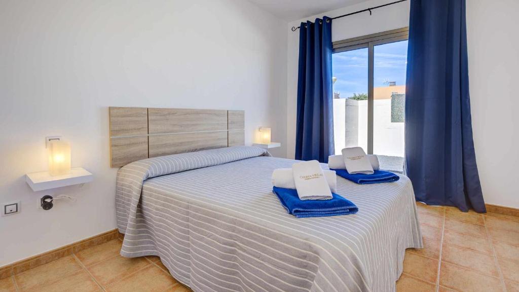 Postel nebo postele na pokoji v ubytování Villa Jarcia by Calima Villas