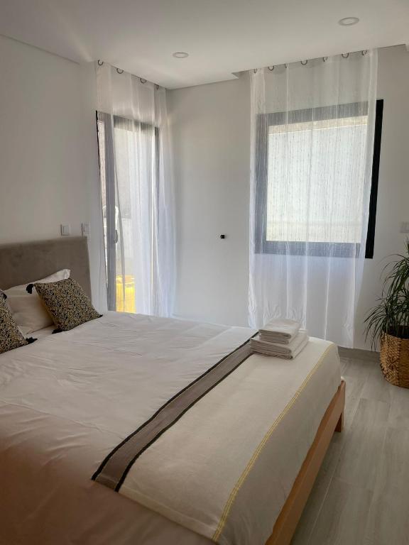 Postel nebo postele na pokoji v ubytování Porto Smart Apartments Comfort