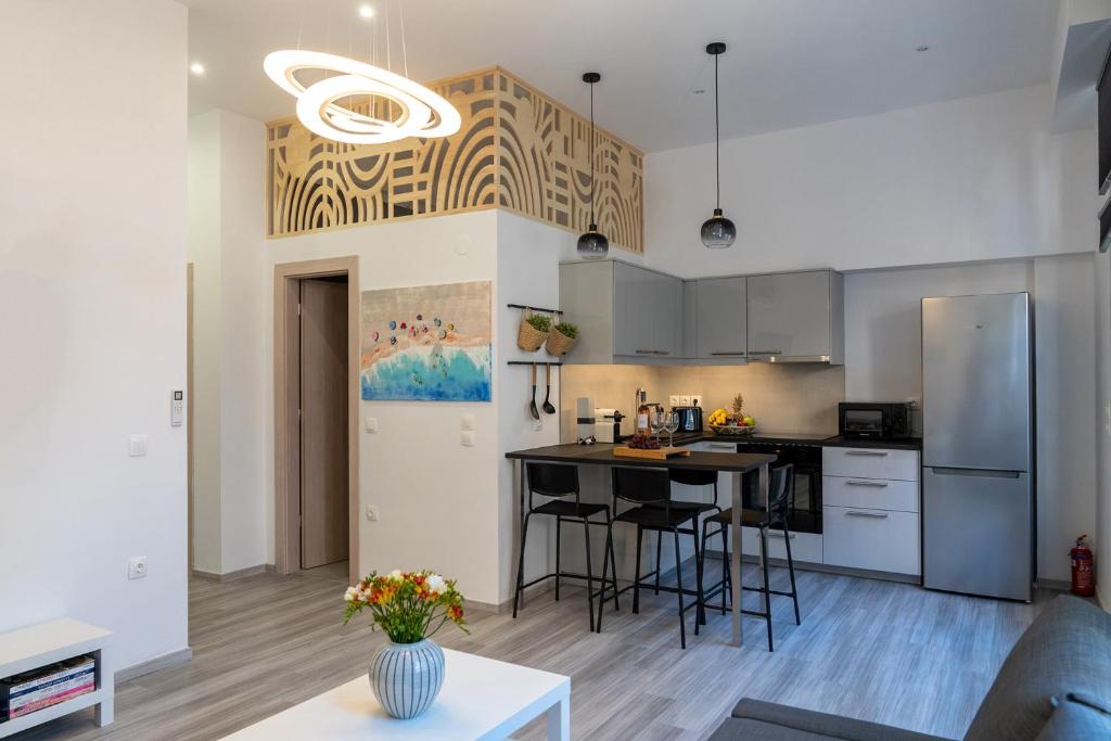 Kuchyň nebo kuchyňský kout v ubytování Central Suites Aegina 2