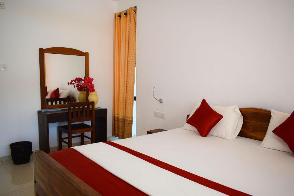 Postel nebo postele na pokoji v ubytování High Park Hotel