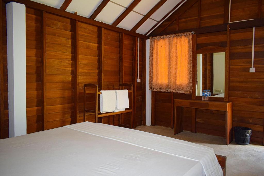 Postel nebo postele na pokoji v ubytování High Park Hotel