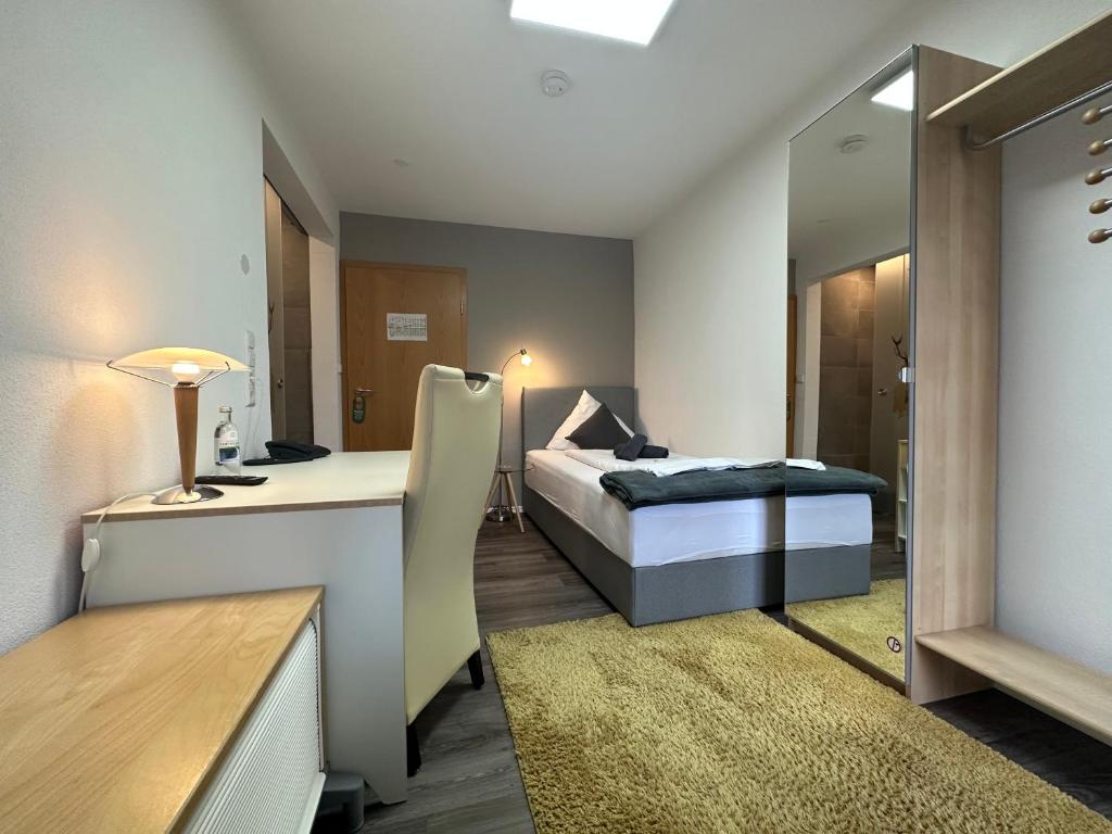 Postel nebo postele na pokoji v ubytování Hotel Il David