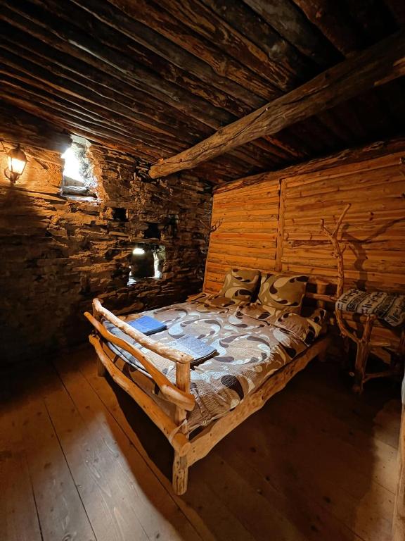 Postel nebo postele na pokoji v ubytování Ethnic Hostel Shatili
