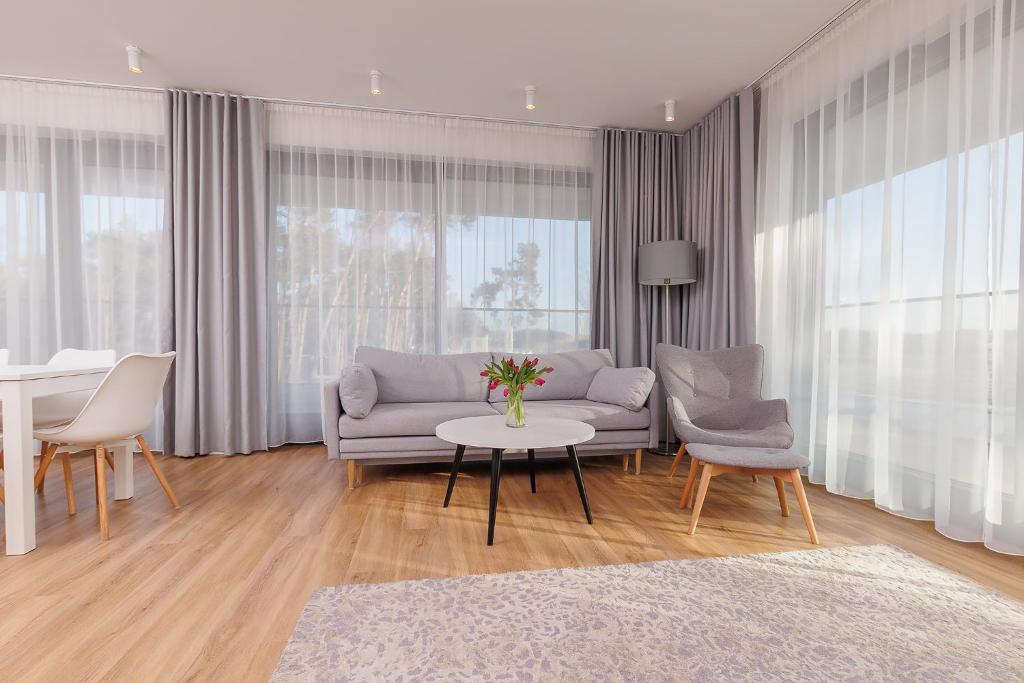 Posezení v ubytování DreamHouse Apartamenty Darłówko Nautic Park