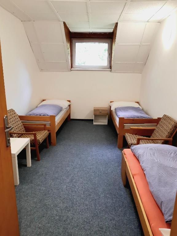 Postel nebo postele na pokoji v ubytování Chata JedlOvka