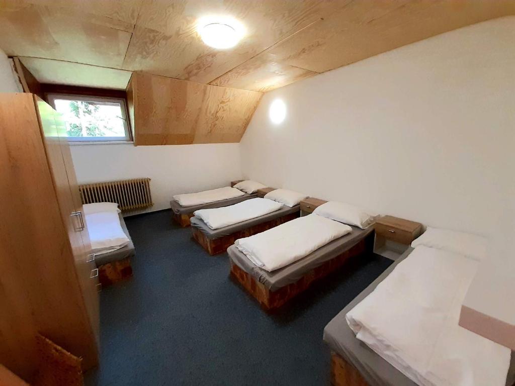 Postel nebo postele na pokoji v ubytování Chata JedlOvka