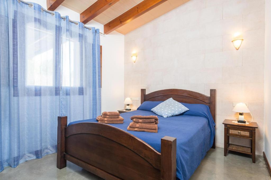 Postel nebo postele na pokoji v ubytování Son Frau