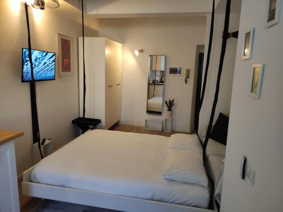 Ліжко або ліжка в номері Appartamento Galgano Prato centro