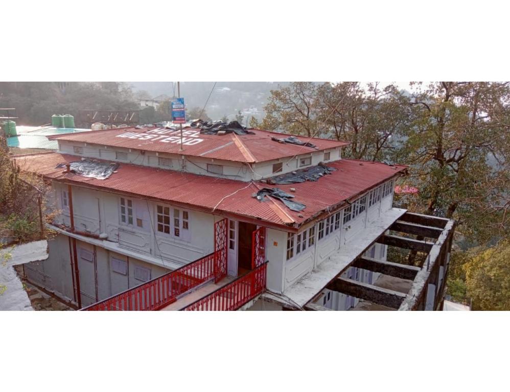 an overhead view of a building with a red roof at Hotel Westend, Mussoorie in Mussoorie