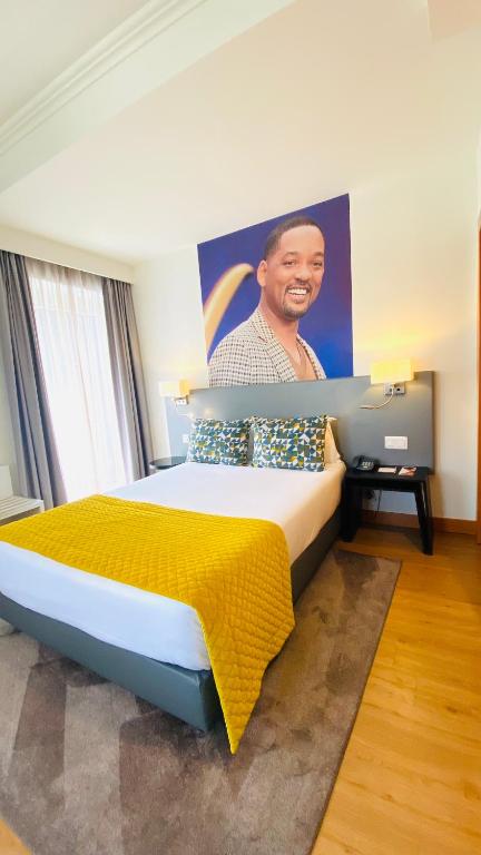Postel nebo postele na pokoji v ubytování America Diamonds Hotel