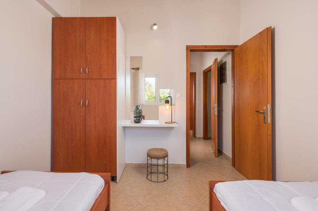 Posteľ alebo postele v izbe v ubytovaní Villa Cleronomia, private pool, seaview,